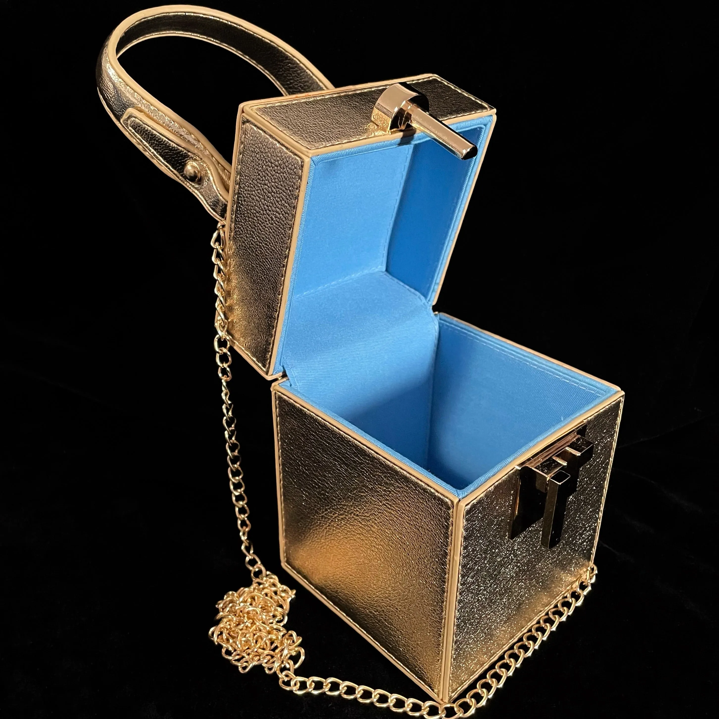 90s STYLE BOX BAG WITH GOLD FITTINGS.