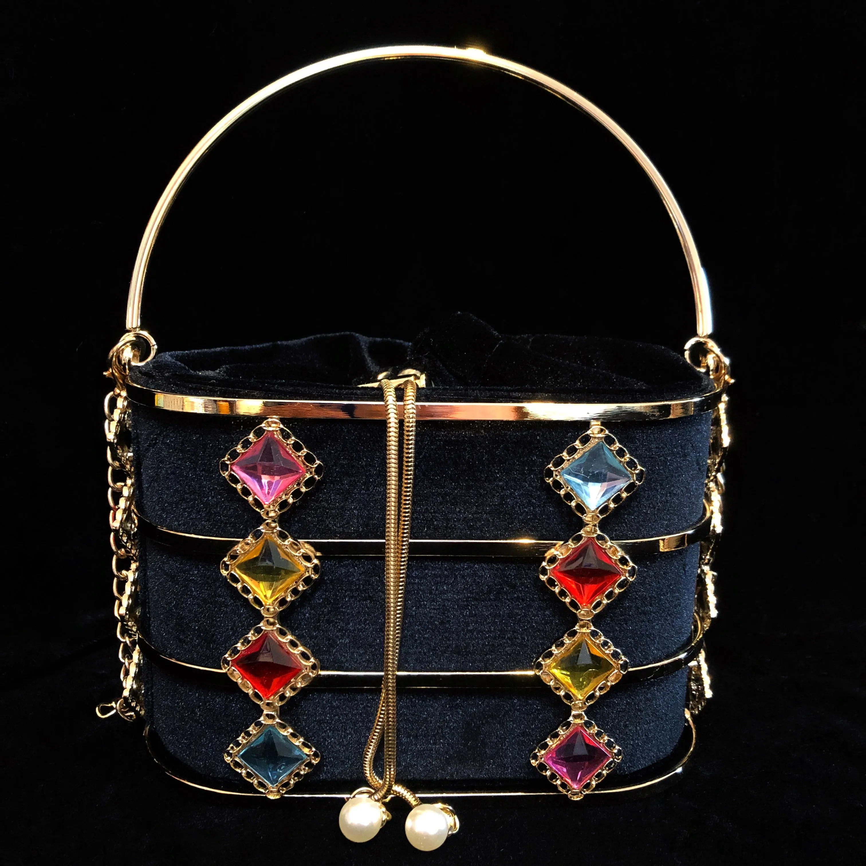 A VELVETINE BASKET BAG WITH JEWEL EMBELLISHED CAGE.