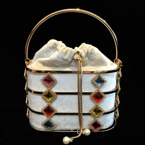A VELVETINE BASKET BAG WITH JEWEL EMBELLISHED CAGE.