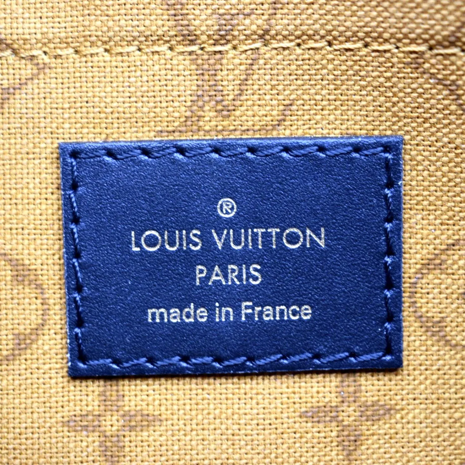 LOUIS VUITTON Neverfull Crafty Monogram Giant Wristlet Pouch Brown