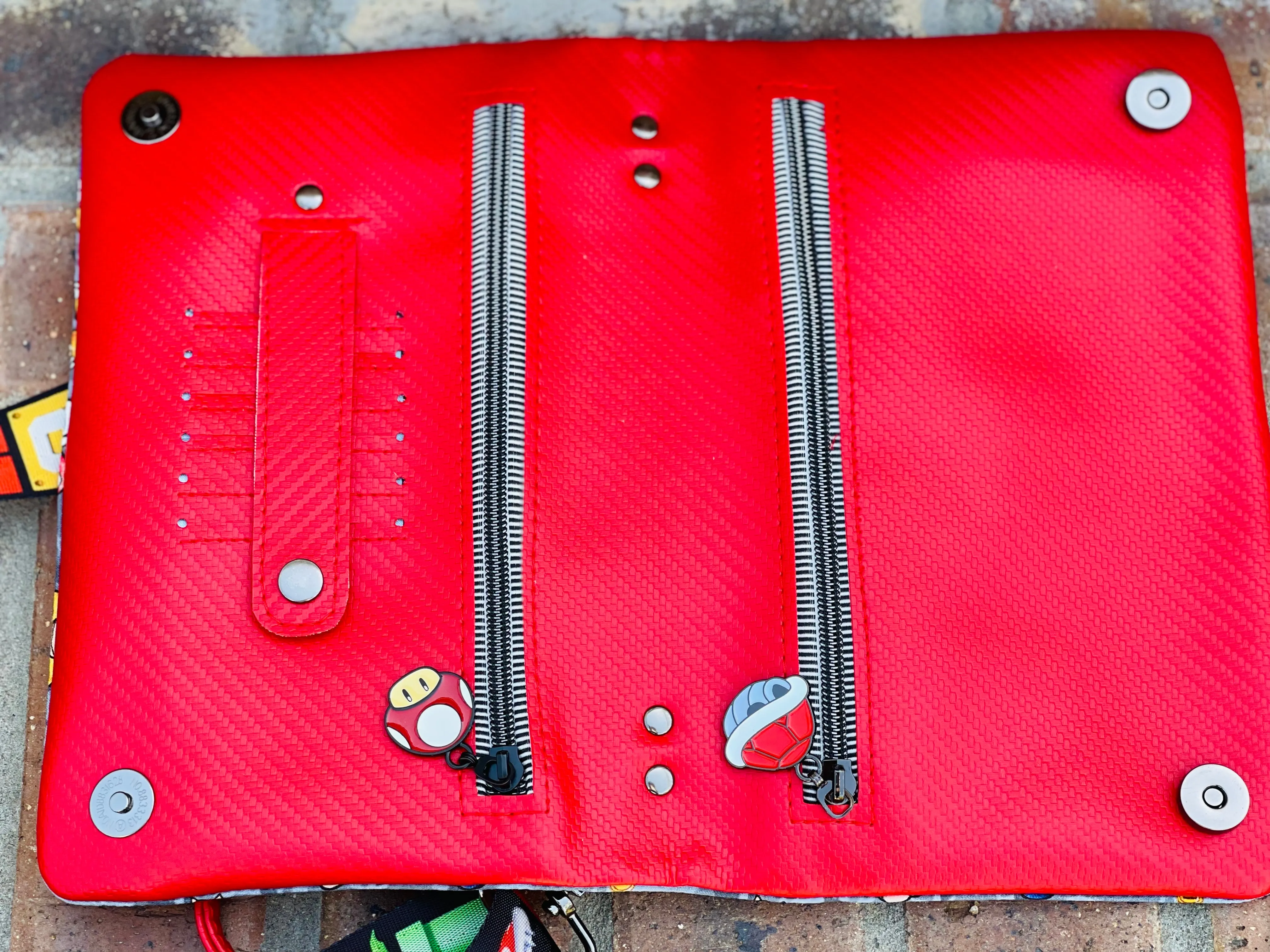 The Bend and Snap Clutch Crossbody Bag in Mario Bros