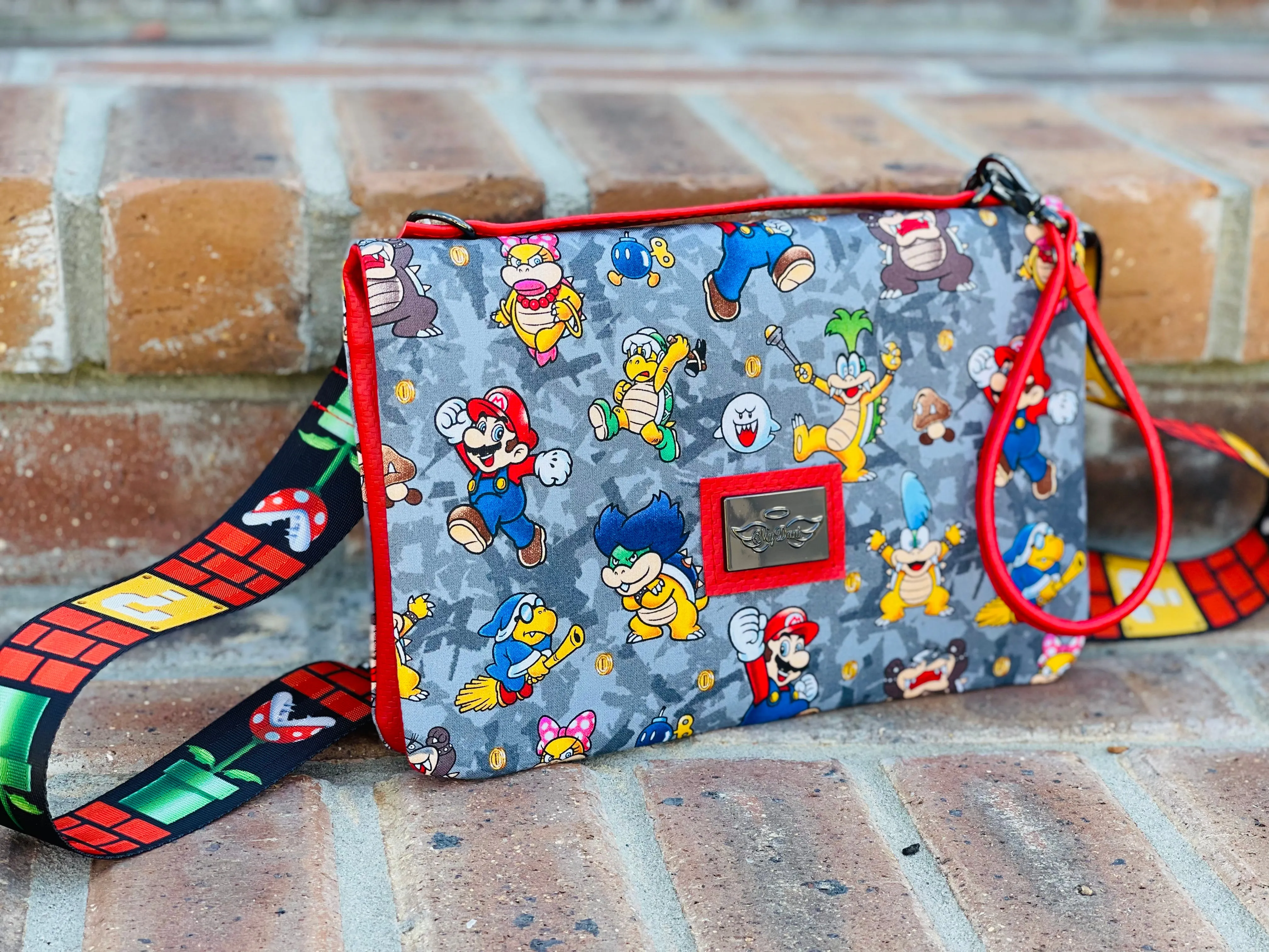 The Bend and Snap Clutch Crossbody Bag in Mario Bros