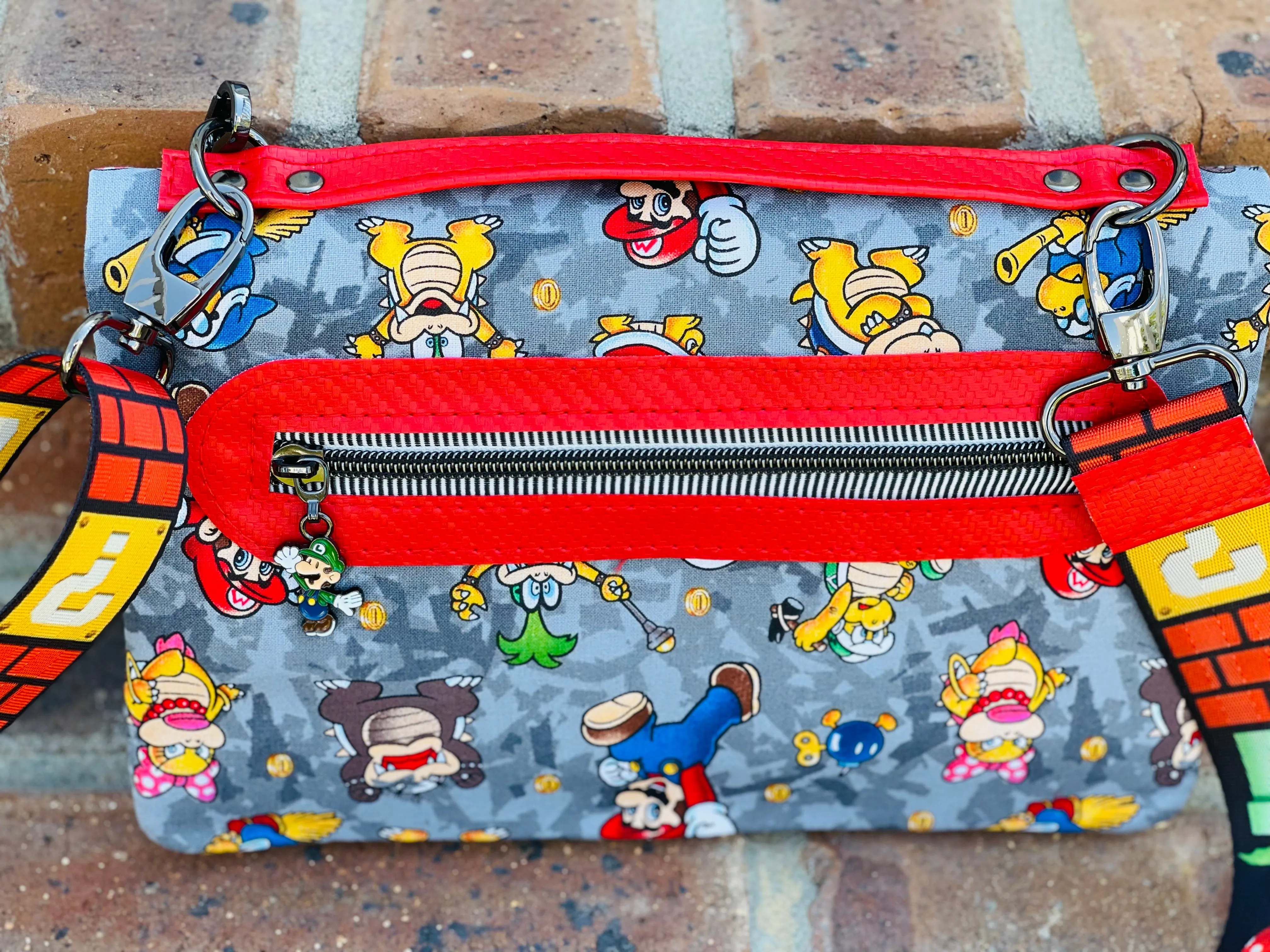 The Bend and Snap Clutch Crossbody Bag in Mario Bros