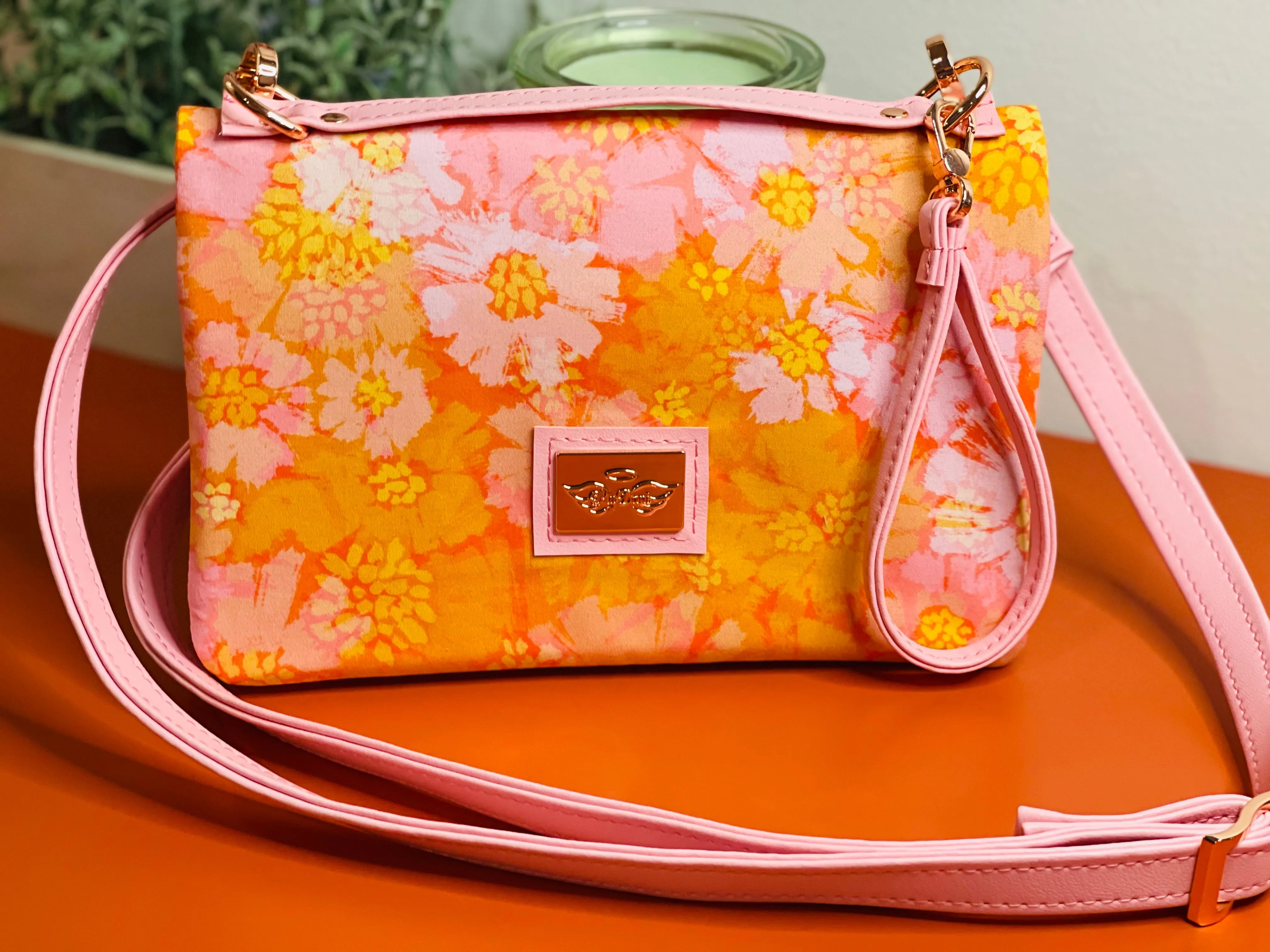The Bend and Snap Clutch in Orange Floral