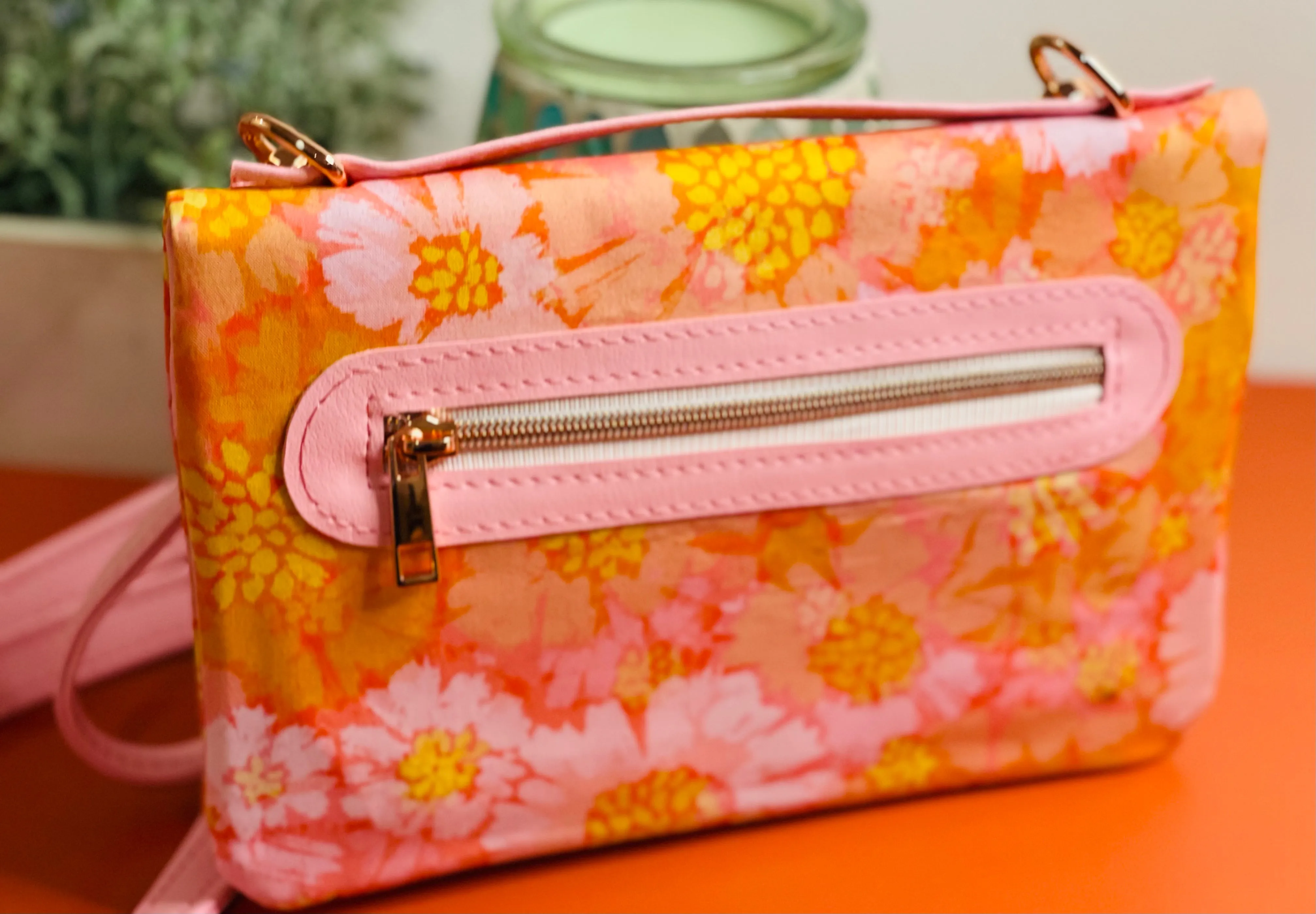 The Bend and Snap Clutch in Orange Floral