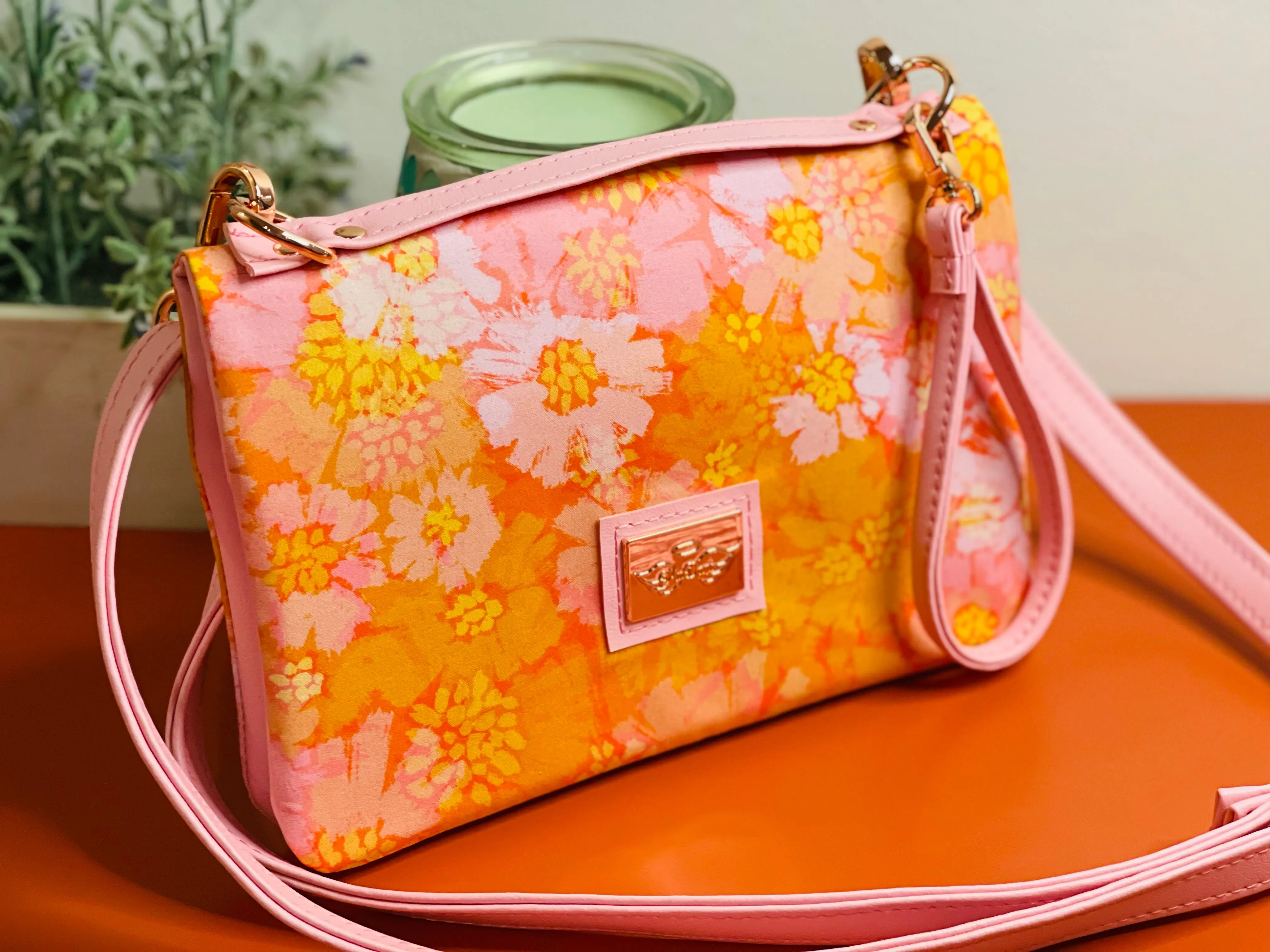 The Bend and Snap Clutch in Orange Floral