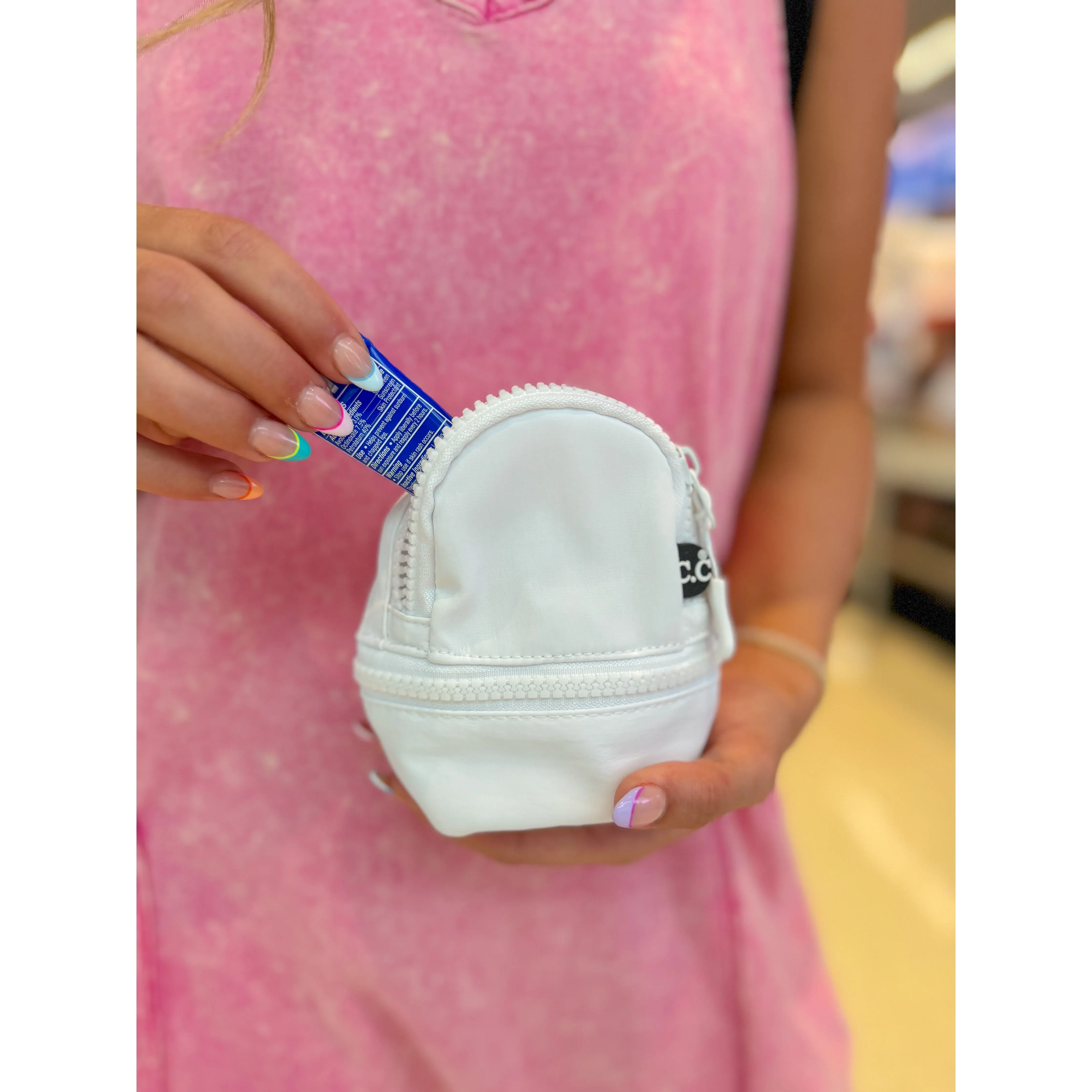 The TINY C.C Backpack Pouch (multiple colors)